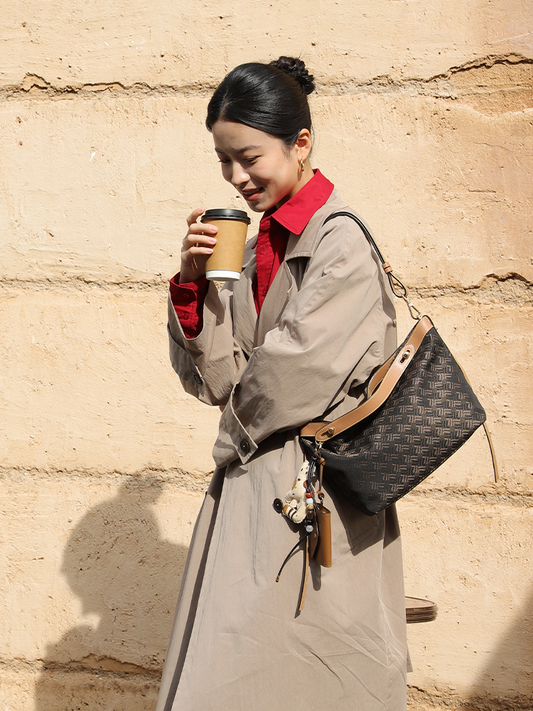 FION 織物鑲牛皮革搖搖袋